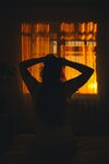 woman-silhouette-front-window-sunrise-window-wake-up-morning_259348-4217.jpg