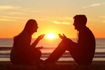 64631611-side-view-of-a-full-body-of-two-friends-or-couple-silhouette-of-teens-sitting-and-tal...jpg