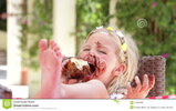 girl-eating-messy-slice-chocolate-cake-sitting-table-large-shot-canon-d-mk-frame-rate-fps-3836...jpg