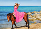 beautiful-girl-red-dress-sits-horse-12544989.jpg